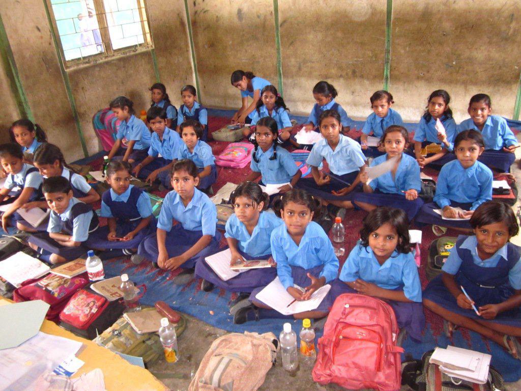 Children sitting together in school classroom